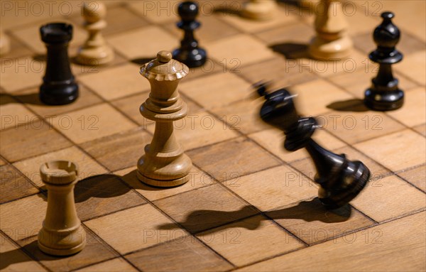 Chessboard with wooden chessmen