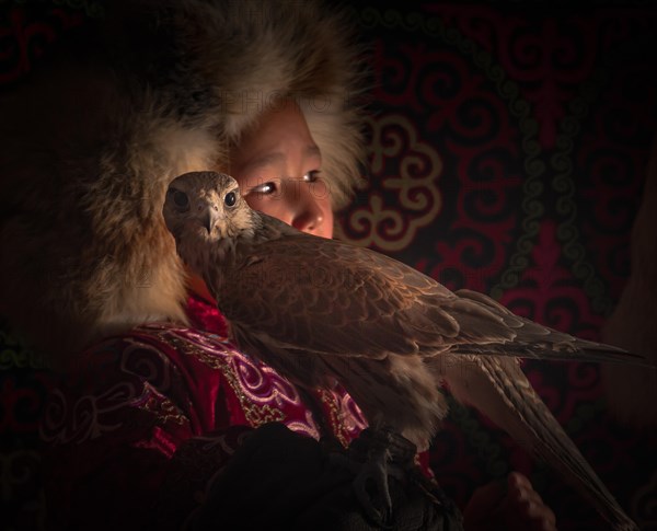 Young falcon hunter