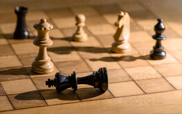 Chessboard with wooden chessmen