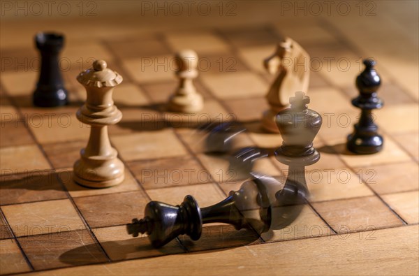 Chessboard with wooden chessmen