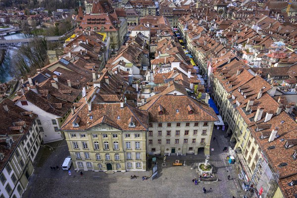 View from the Bernese Minster to the Muensterplatz and the red tiled roofs of the houses in the historic centre of the old town