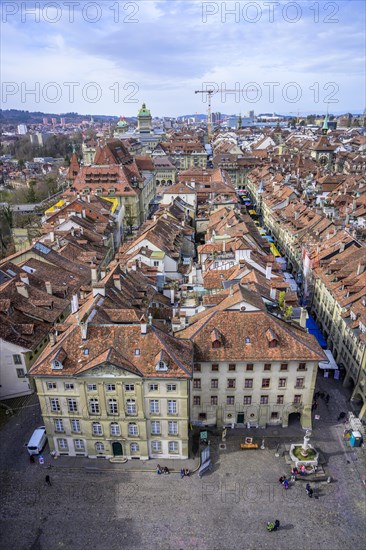 View from the Bernese Minster to the Muensterplatz and the red tiled roofs of the houses in the historic centre of the old town