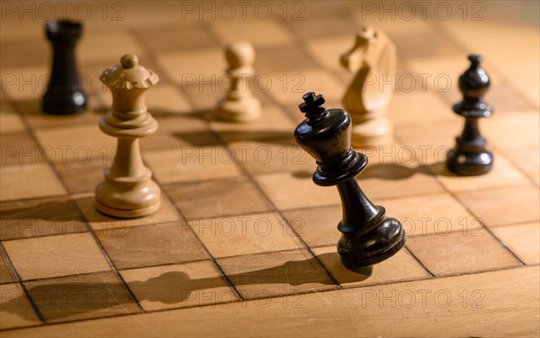 Chessboard with wooden chessmen