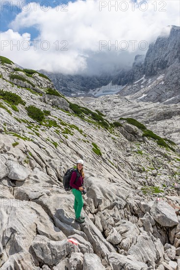 Mountaineer on marked route from Simonyhuette to Adamekhuette