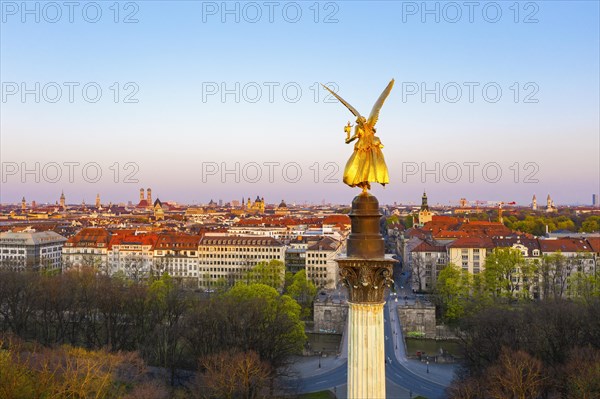 Golden angel of peace in the morning light