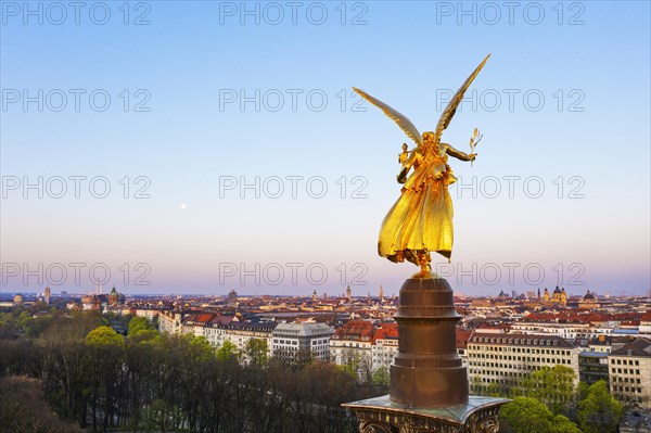 Golden angel of peace in the morning light