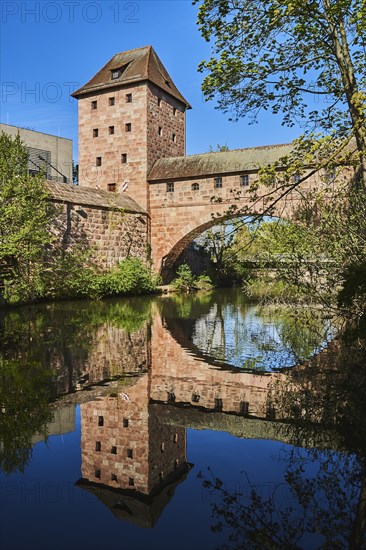 Old city wall with bridge over the Pegnitz