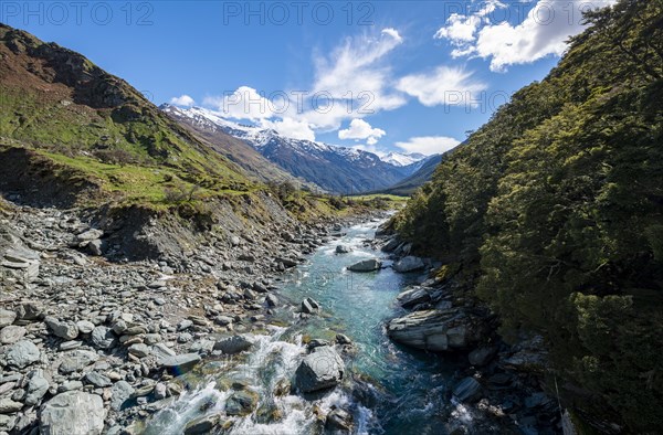 Rob Roy Stream and snow covered mountains