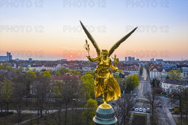 Golden Angel of Peace at sunrise