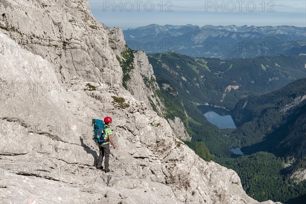 Hiker on rocky route from Simonyhuette to Adamekhuette