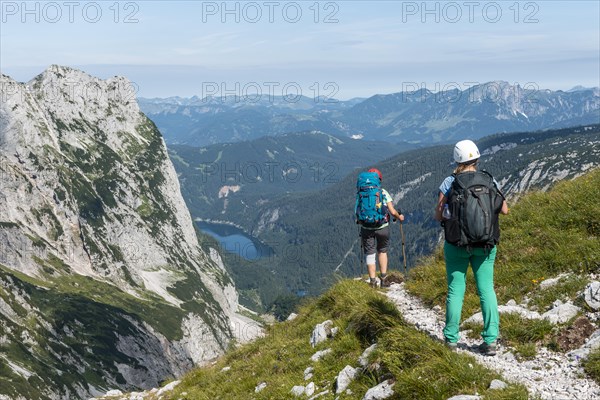 Hiker on hiking trail from Simonyhuette to Adamekhuette