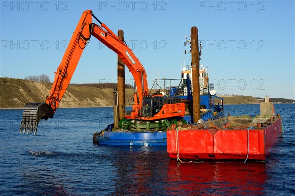 Dredger boat at work