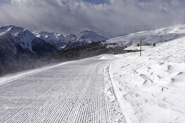 Freshly rolled ski slope at the Ausserschwemmalm mountain restaurant