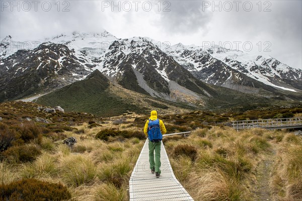 Hiker on trail in Hooker Valley, Mount Cook National Park