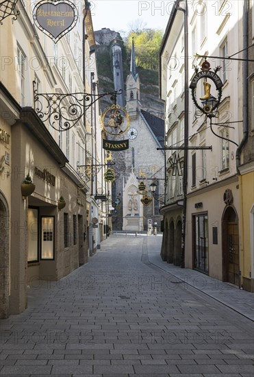 Vacant places due to the coronavirus pandemic, Getreidegasse with Buergerspitalskirche