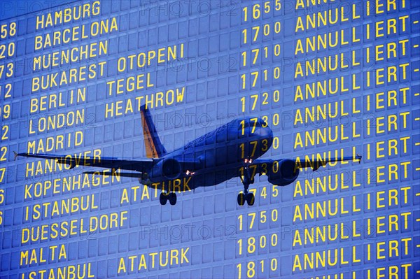 PHOTO MONTAGE, arrival and departure board at the airport