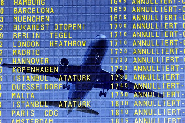 PHOTO MONTAGE, arrival and departure board at the airport