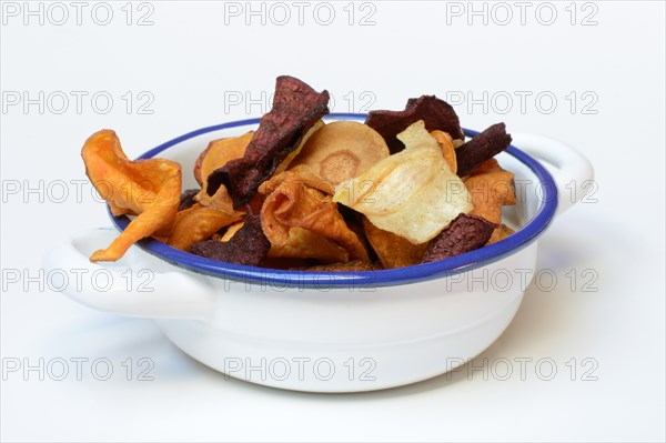 Vegetable chips in shell, food photography
