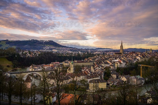 City view at sunrise, view from the rose garden to the old town