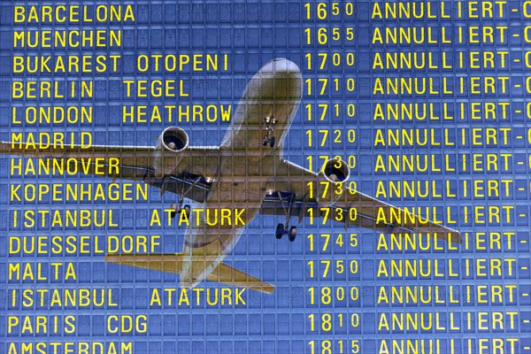 PHOTO MONTAGE, arrival and departure board at the airport
