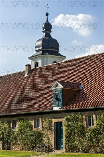 Farm building, at the back northern castle tower