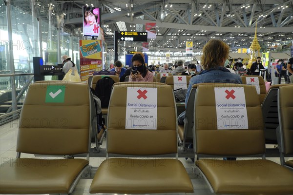 Seats marked with green hook and red cross, keep your distance