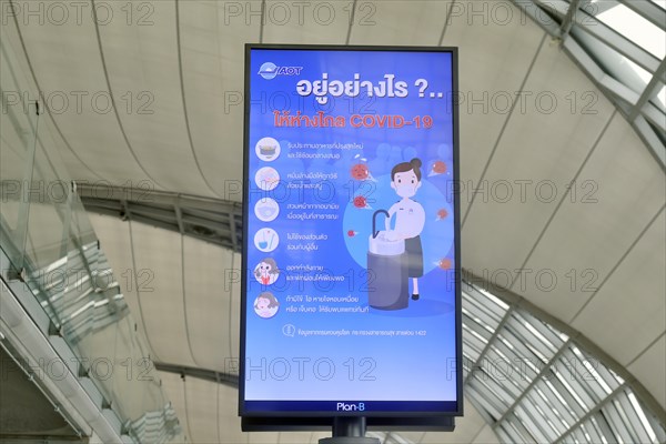 Sign with rules of conduct in Thai, Corona crisis