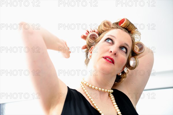 Woman with curlers