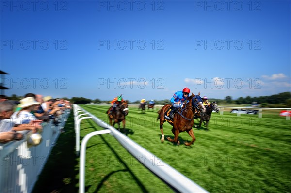 Jockey on racehorse