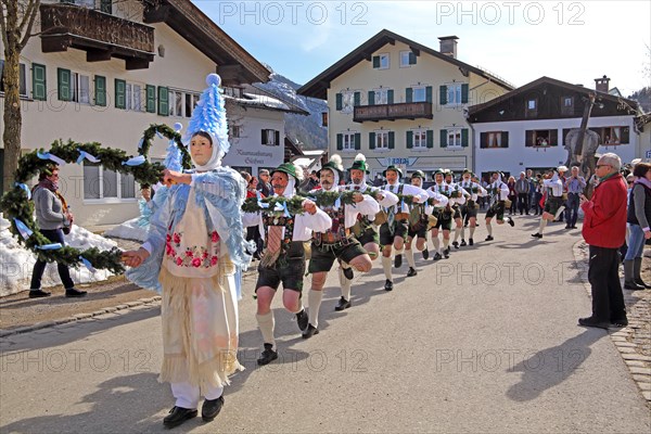 Bell stirrer in the Maschkera procession at carnival