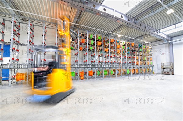 Industrial hall with forklift truck