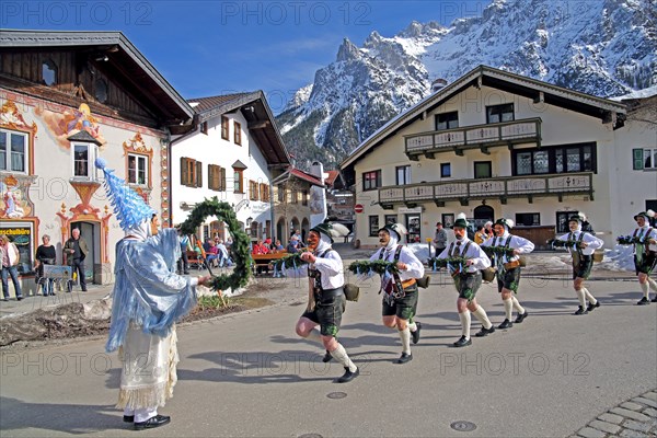 Bell stirrer in the Maschkera procession at carnival