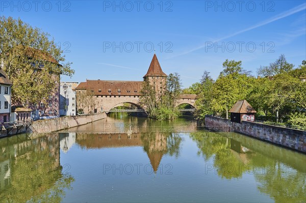 View of the Fronveste and the Schalyerturm and the Kettensteg with the Pegnitz river