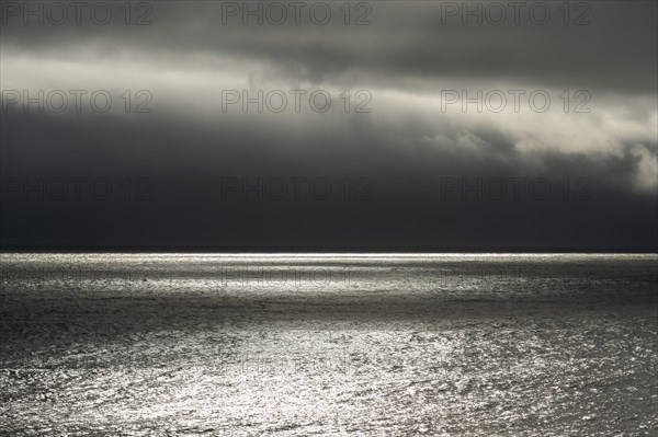 Dark clouds over the sea