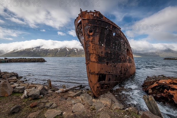 Rusty shipwreck on the beach