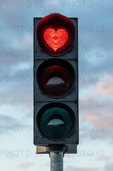 Traffic light with red heart