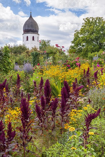 Abbey garden and church tower of Abtei Frauenwoerth Abbey