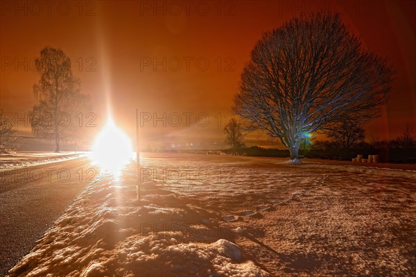 Car light dazzles on road