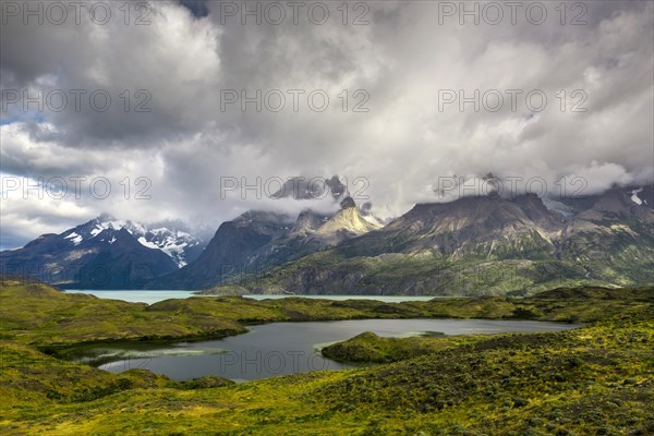 View over Lake Nordenskjoeld to the mountain range Cuernos del Paine in clouds