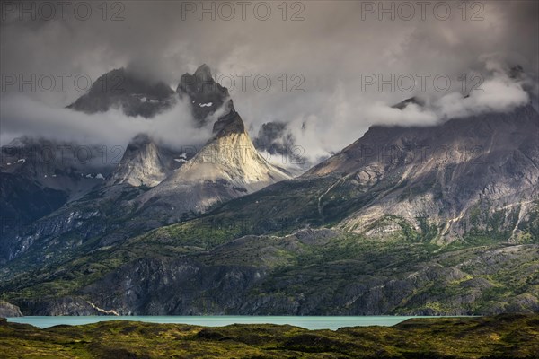 View over Lake Nordenskjoeld to the mountain range Cuernos del Paine in clouds