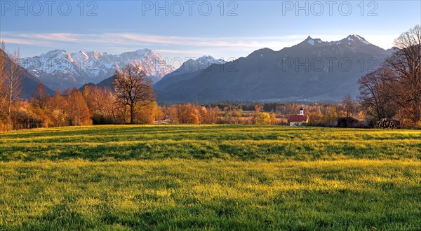 Early spring landscape near the hamlet of Weichs towards the Zugspitze massif