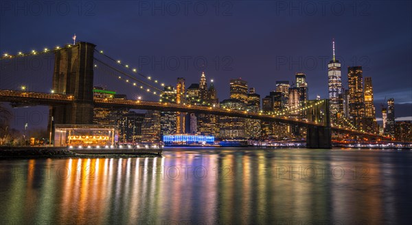 View from Main Street Park at night over the East River to the skyline of lower Manhattan