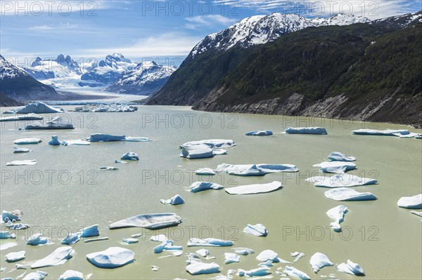 Glacial lake with small icebergs floating