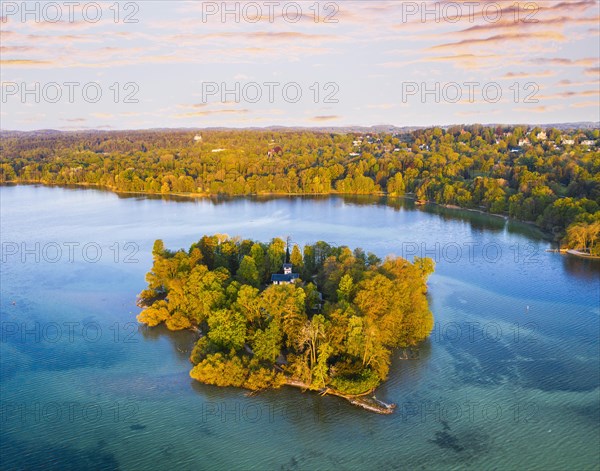 Rose island with castle in the Starnberger See near Feldafing in the morning light