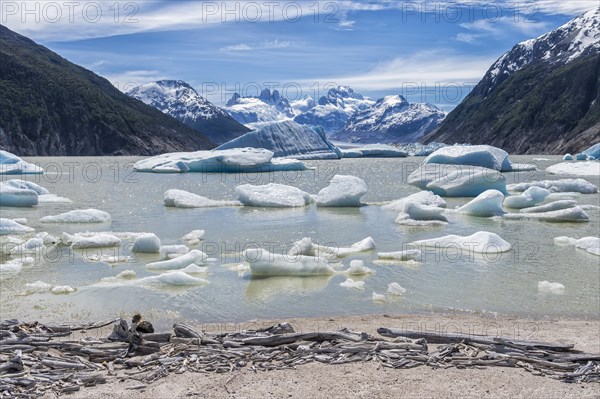 Glacial lake with small icebergs floating