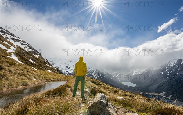 Hiker looks into the Hooker Valley