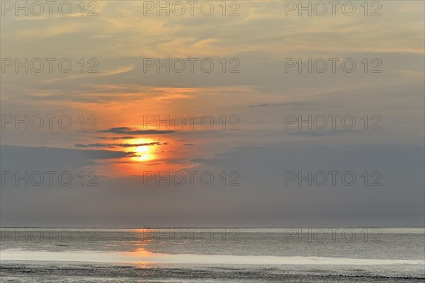 Sunset at the Wadden Sea at low tide