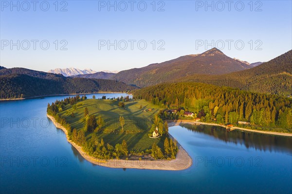 Walchensee with peninsula dwarfs in the morning light