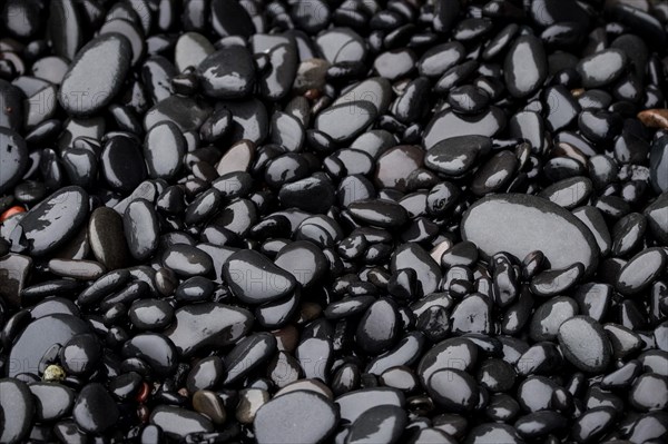 Black lava pebbles at Reynisfjara beach