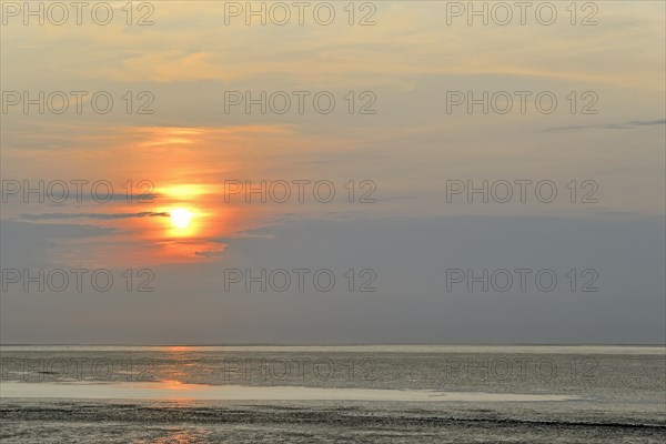 Sunset at the Wadden Sea at low tide